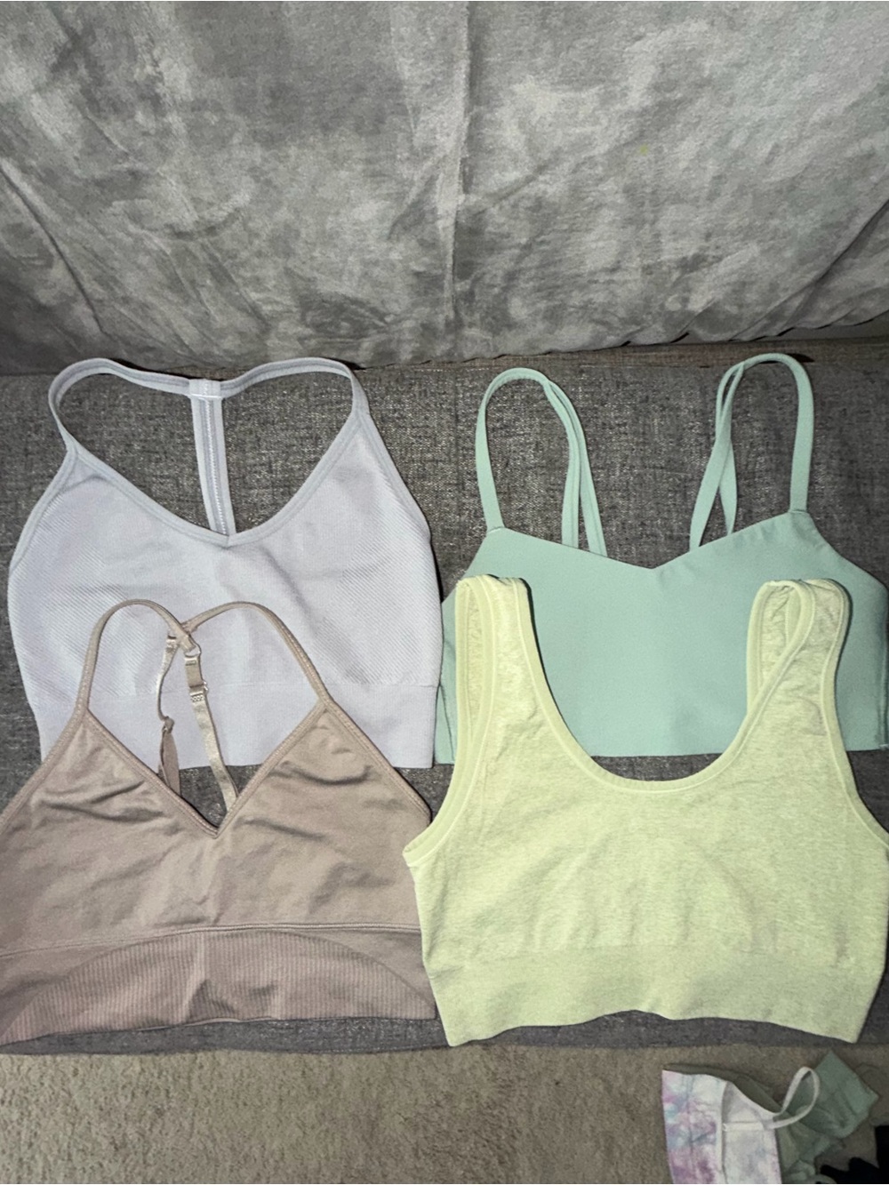 Bundle of 4 miscellaneous sports bras- S